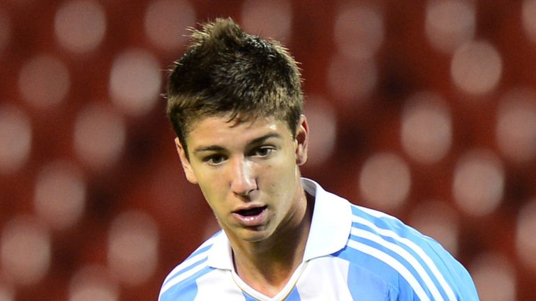 Argentina's midfielder Luciano Vietto controls the ball