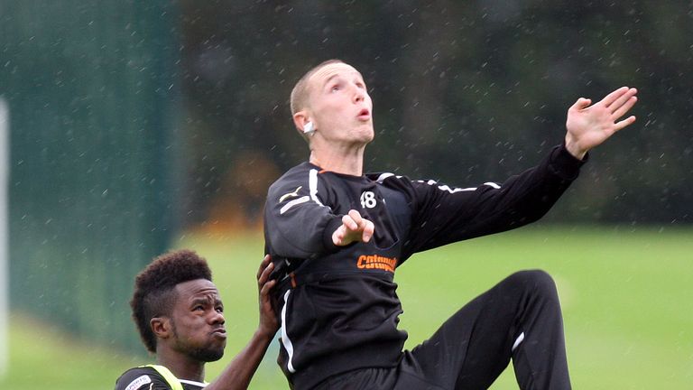 NEWCASTLE, ENGLAND - AUGUST 29 :  Geal Bigiyarama (left) competes with an aerial Marcus Maddison during a Newcastle United training session at The Little B