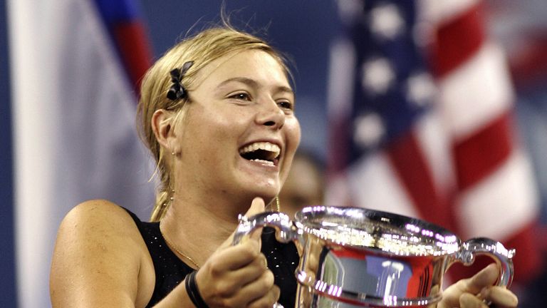 Maria Sharapova holds her trophy after winning the 2006 US Open