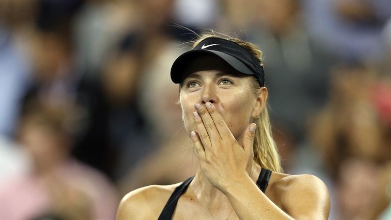 Maria Sharapova reacts after defeating Maria Kirilenko during her women's singles first round match on Day One of the US Open