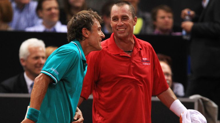 Ivan Lendl (R) shakes hands with Mats Wilander during an exhibition match at the Porsche Tennis Grand Prix on April 18, 2011 in Stuttgart, Germany