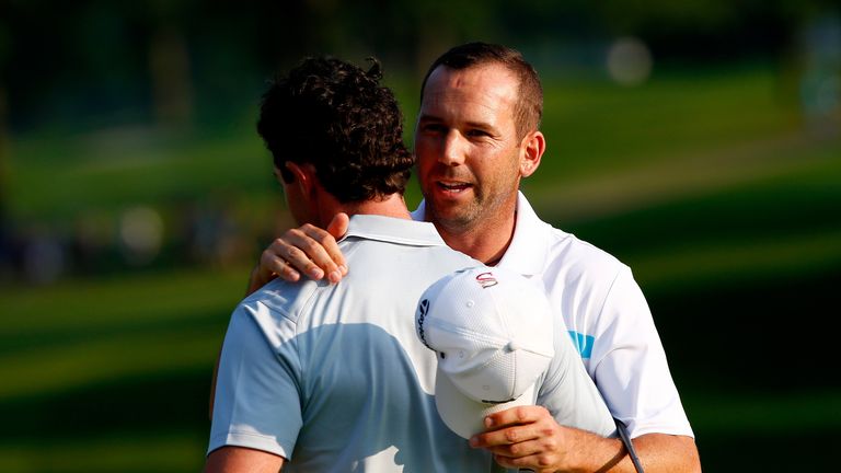 Gracious embrace: Garcia was first to congratulate McIlroy after he finished on top in Ohio