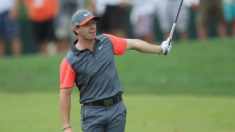 Rory McIlroy: Hooks his second shot out of bounds on the 10th