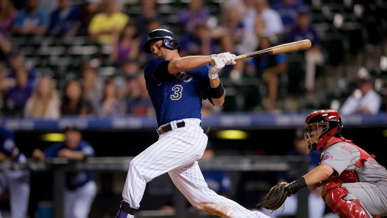 Michael Cuddyer #3 of the Colorado Rockies doubles in two runs to complete the cycle in the eighth inning