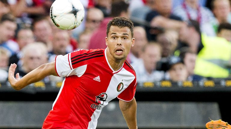 Feyenoord Rotterdam player Mitchell Te Vrede (L) vies for the ball with Besiktas player Necip Uysal