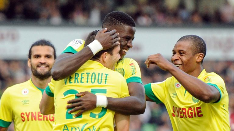 Nantes' French midfielder Jordan Veretout (2nd L) jubilates after scoring a goal during the French L1 football match between FC Metz and FC Nantes