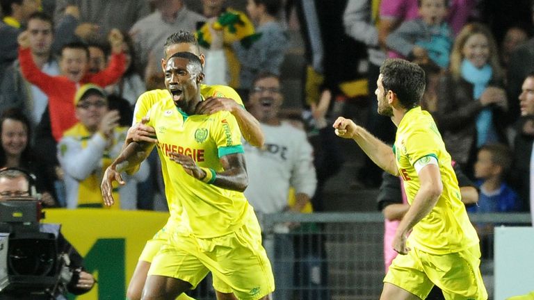 Nantes' Togolese forward Serge Gakpe (L) celebrates with teammates after scoring a goal