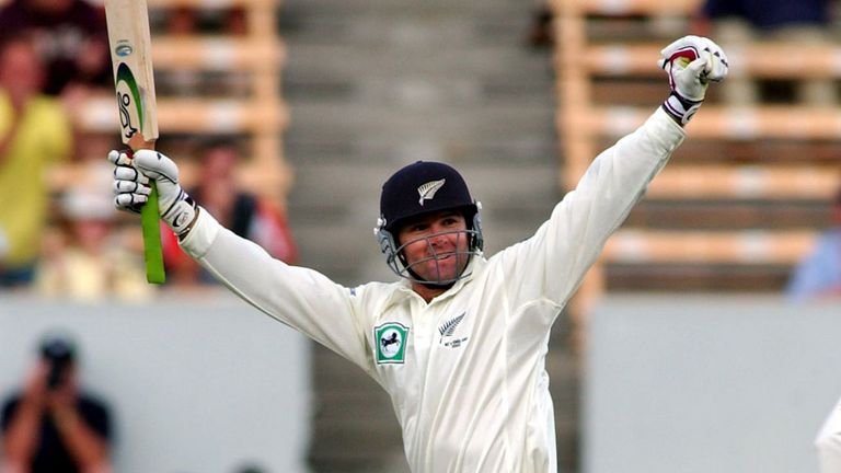 Nathan Astle celebrates reaching his double hundred