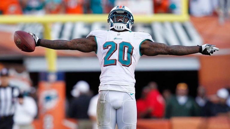 MIAMI GARDENS, FL - DECEMBER 23: Reshad Jones #20 of the Miami Dolphins celebrates after intercepting a pass by Ryan Fitzpatrick #14 (not pictured) of the 
