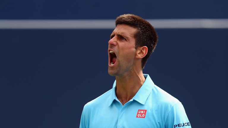 Novak Djokovic celebrates after winning a match at the Rogers Cup