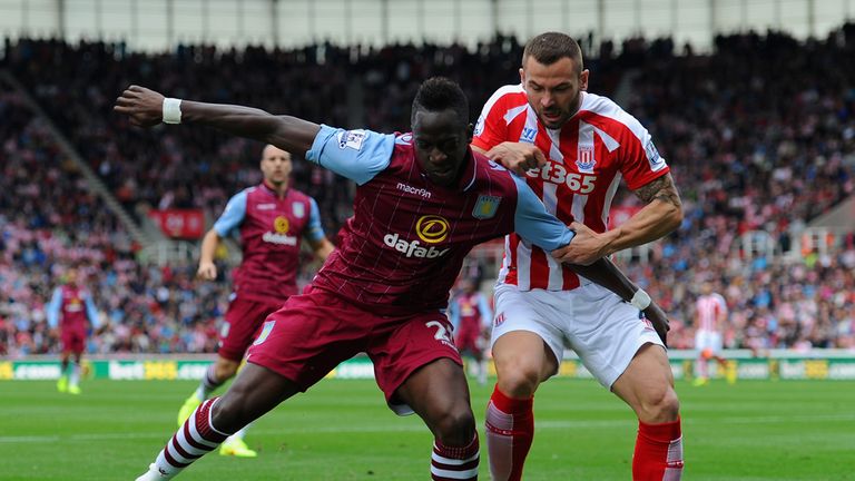 Aly Cissokho of Aston Villa and  Phillip Bardsley of Stoke City during the Barclays Premier League match between Stoke and Aston Villa