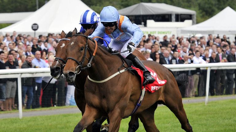 Tatlisu ridden by Graham Lee (right) win the Betfred Half Time In Play Boosts Handicap during the John Smith's Northumberland Plate Day at Newcastle Raceco