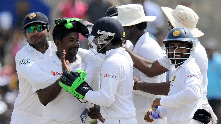 Sri Lanka spinner Rangana Herath celebrates after dismissing Pakistan batsman Asad Shafiq during the final day of the first Test in Galle