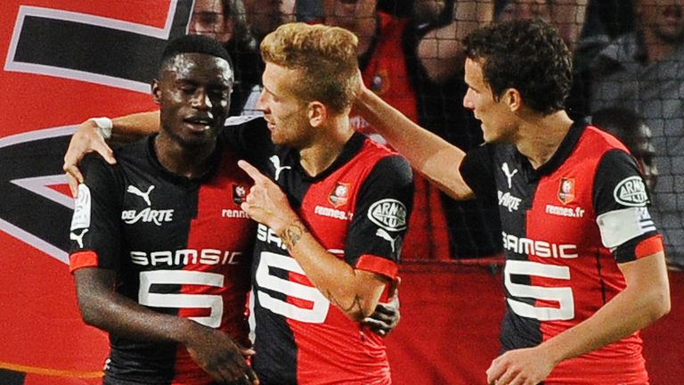 Paul-Georges Ntep (L) celebrates with his teammates after scoring a goal during the match between Stade Rennais FC and Evian-Thonon Gaillard FC