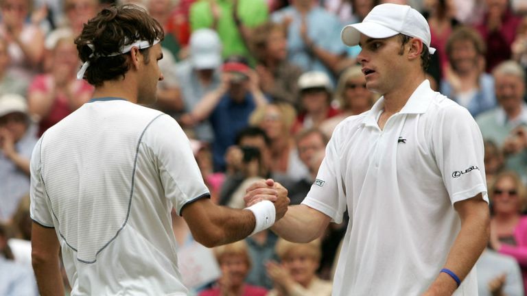Roger Federer and Andy Roddick shake hands after Federer won in straight sets in the 2005 Wimbledon men's singles final