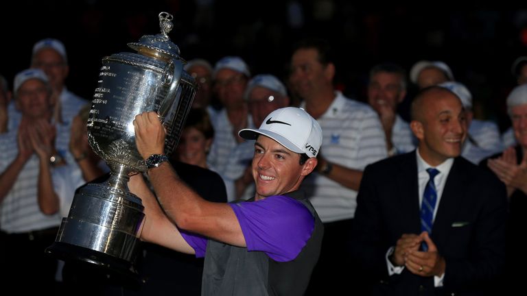 LOUISVILLE, KY - AUGUST 10:  Rory McIlroy of Northern Ireland celebrates with the Wanamaker trophy after his one-stroke victory during the final round of t
