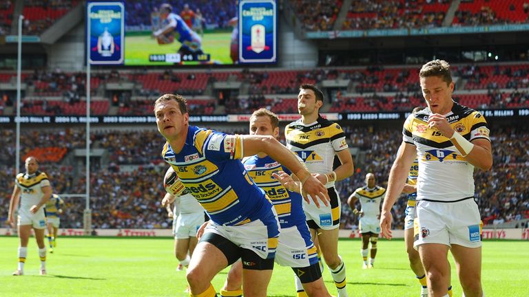 Leeds Rhinos' Danny McGuire celebrates scoring his sides second try of the game during the Tetley's Challenge Cup Final at Wembley Stadium, London. PRESS A