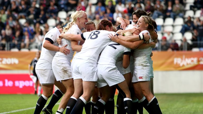 England celebrate after Emily Scarratt scores a try in the final