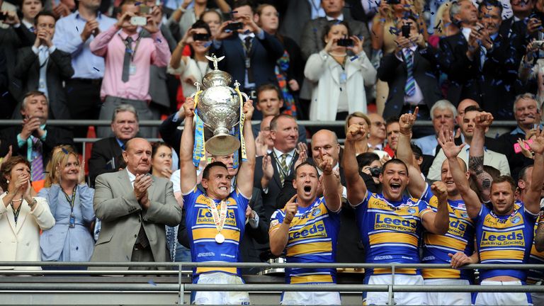 Leeds Rhinos' Kevin Sinfield lifts the Tetley's Challenge Cup after his team won the Final at Wembley Stadium, London.