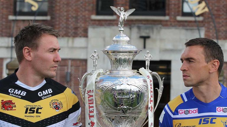 Castleford Tigers' Michael Shenton and Leeds Rhinos' Kevin Sinfield (right) pose with the trophy during a press call at the Tetley, Leeds.