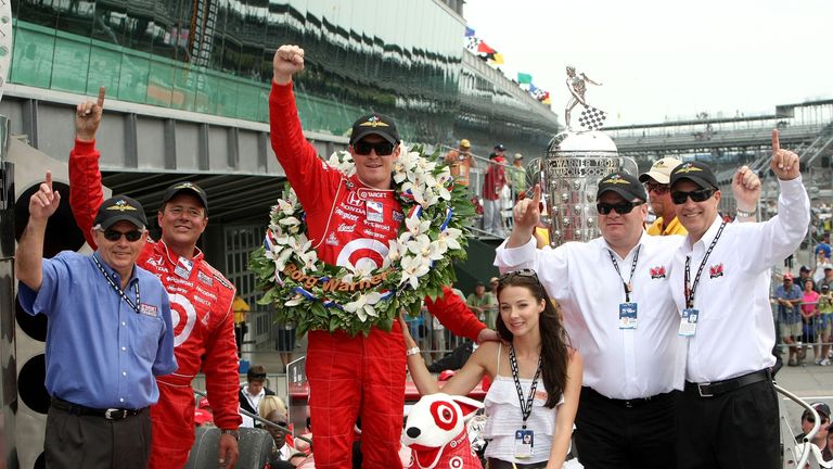 Scott Dixon celebrates in victory lane at the Indy 500 in 2008