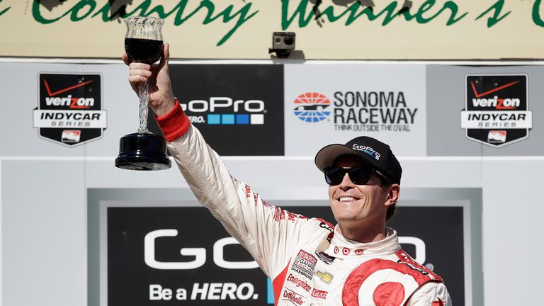 Scott Dixon toasts the crowd with a glass of wine at Sonoma