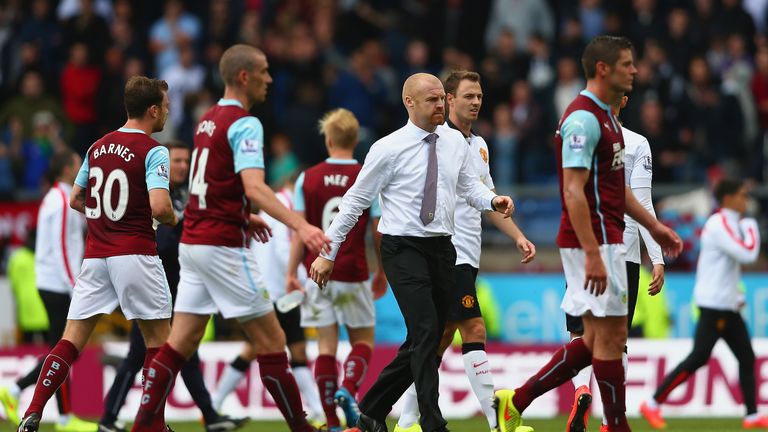 Burnley manager Sean Dyche walks across the pitch at the final whistle