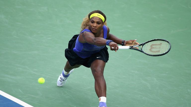 Serena Williams hits a return during her match on day 8 of the Western & Southern Open