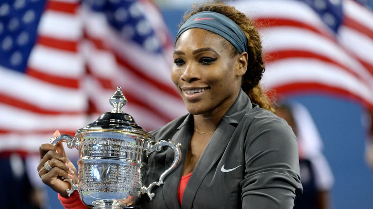 Serena Williams holds the trophy as she celebrates her win over Victoria Azarenka during their 2013 US Open women's final