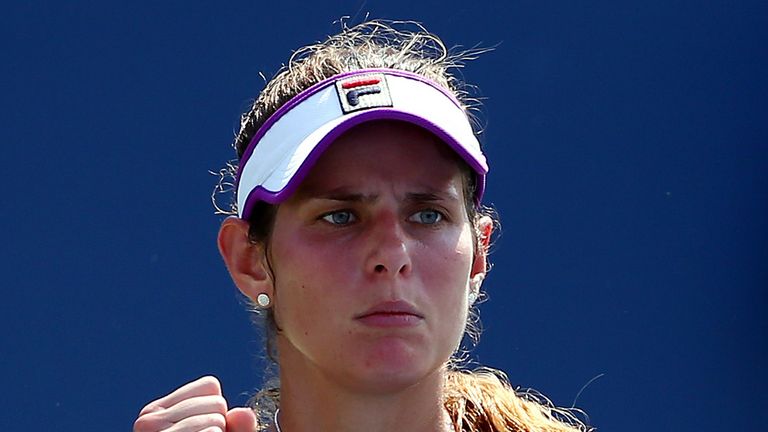 Julia Goerges of Germany reacts against Flavia Pennetta of Italy during their women's singles first round match