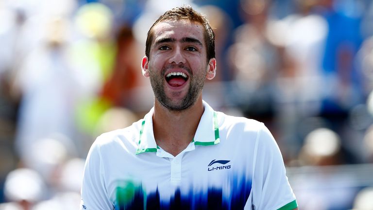 Croatian Marin Cilic was in jubilant spirits as he claimed a place in the next round as Cypriot Marcos Baghdatis was forced to retire