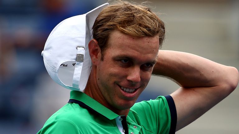 NEW YORK, NY - AUGUST 30: Sam Querrey of the United States looks on against Novak Djokovic of Serbia during their men's singles third round match on Day Si
