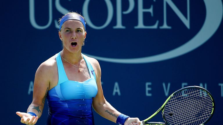 NEW YORK, NY - AUGUST 26:  Svetlana Kuznetsova of Russia reacts against Marina Erakovic of New Zealand on Day Two of the 2014 US Open at the USTA Billie Je