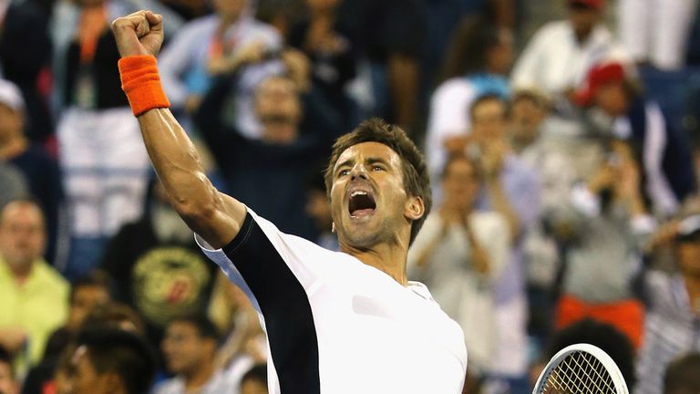 NEW YORK, NY - AUGUST 30:  Tommy Robredo of Spain celebrates match point against  Nick Kyrgios of Australia on Day Six of the 2014 US Open at the USTA Bill