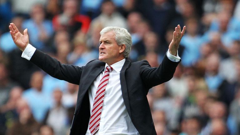 Stoke City's manager Mark Hughes during the Barclays Premier League match at the Etihad Stadium, Manchester.