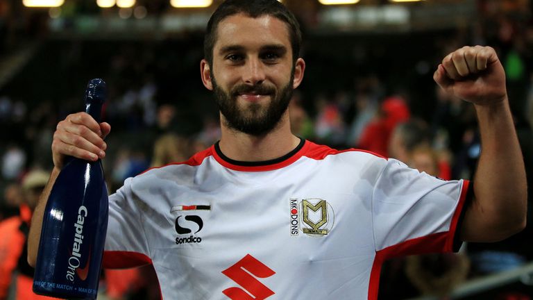 Milton Keynes Dons goalscorer Will Grigg with the man of the match award after 4.0 win over Manchester United, during the Capital One Cup Second Round matc