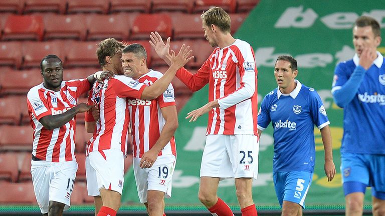 Stoke City's Jonathan Walters (3rd left) celebrates scoring his teams 1st goal against Portsmouth, during the Capital One Cup Second Round match