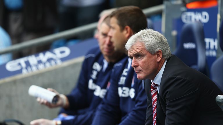 Stoke City manager Mark Hughes looks on