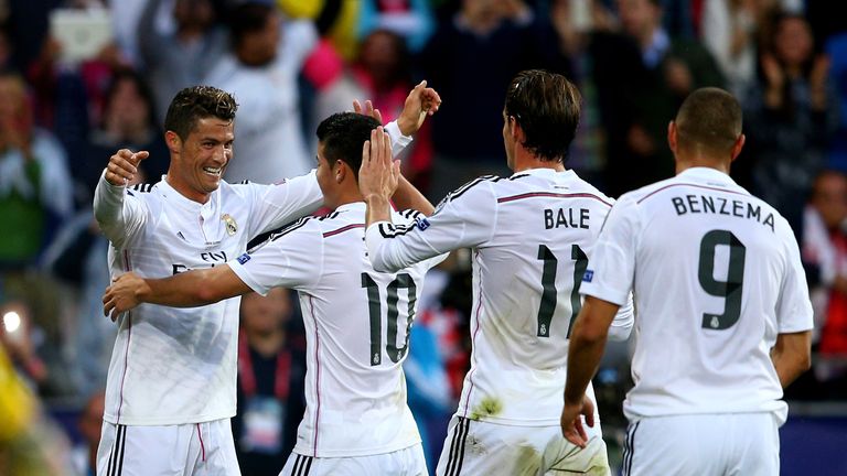 CARDIFF, WALES - AUGUST 12:  (L-R) Cristiano Ronaldo of Real Madrid celebrates with teammates James Rodriguez, Gareth Bale and Karim Benzema after scoring 
