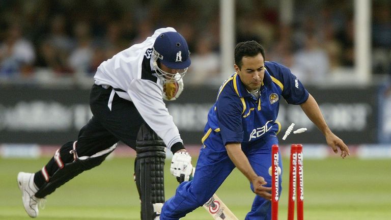 Neil Smith of Warwickshire Bears is run out by Adam Hollioake of Surrey Lions at the inaugural Twenty20 Finals Day at Trent Bridge