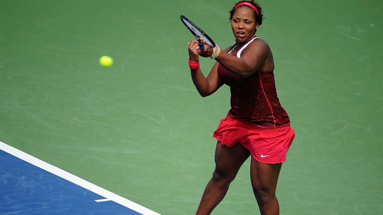 Taylor Townsend returns to Silvia Soler Espinosa of Spain during the Western & Southern Open in Cincinnati 2014