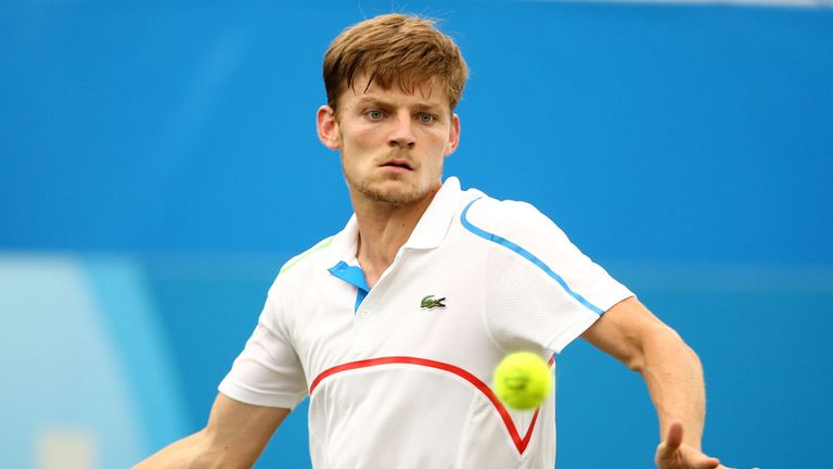 EASTBOURNE, ENGLAND - JUNE 15:  David Goffin of Belgium in action against Tobias Kamke of Germany during their Men's Singles third round qualifying match o