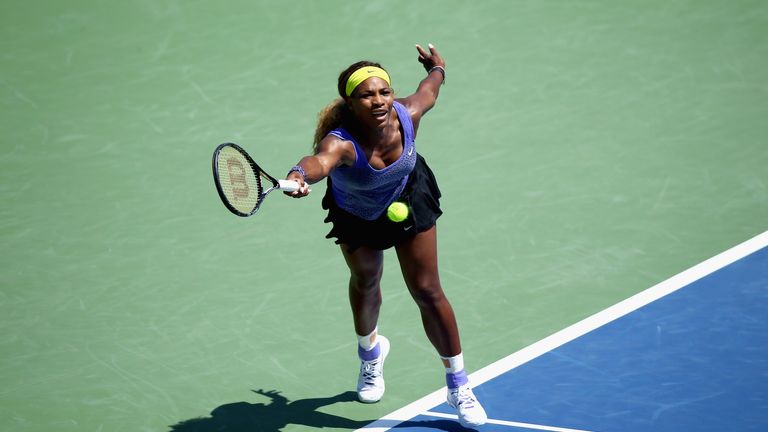 CINCINNATI, OH - AUGUST 13:  Serena Williams hits a return during her match against Samantha Stosur of Australia during a match on day 5 at Western & South
