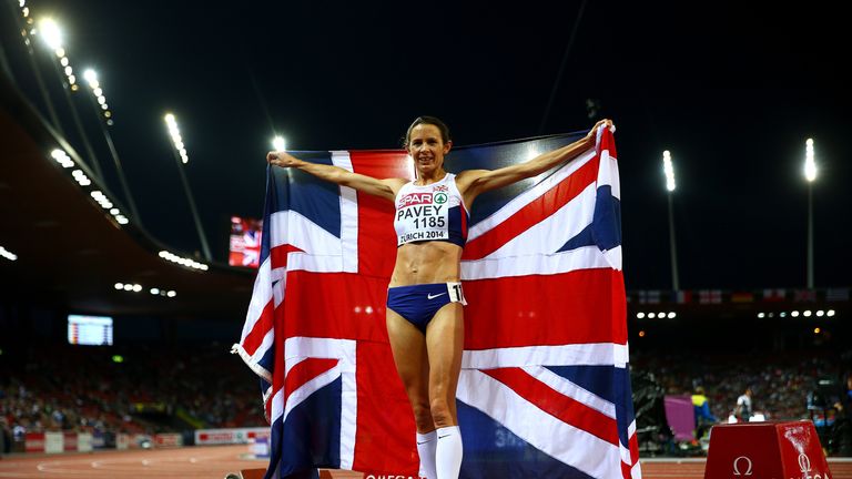 ZURICH, SWITZERLAND - AUGUST 12:  Jo Pavey of Great Britain and Northern Ireland poses with a Union Jack after winning gold in the Women's 10,000 metres fi