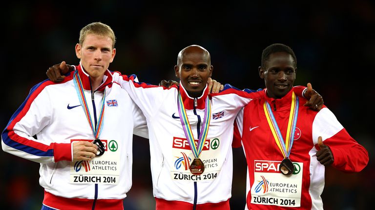 Gold medalist Mo Farah poses next to silver medalist Andy Vernon (left) and bronze medalist Ali Kaya (right)