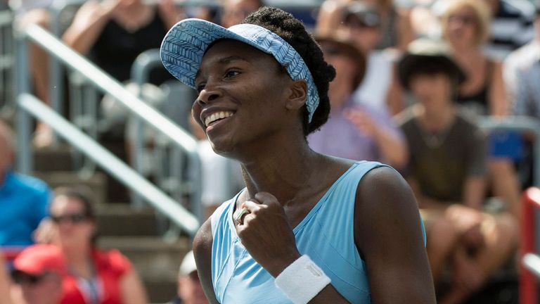 Venus Williams of the United States celebrates after beating her sister Serena 6-7, 6-2, 6-3 during semifinal play at the Rogers Cup tennis tournament