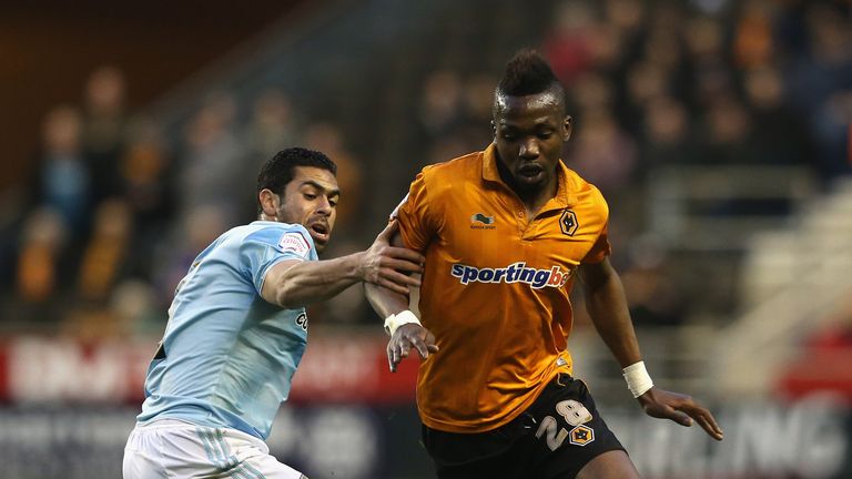 WOLVERHAMPTON, ENGLAND - APRIL 16:  Tongo Doumbia of Wolves moves away from Ahmed Fathi  during the npower Championship match between Wolverhampton Wandere