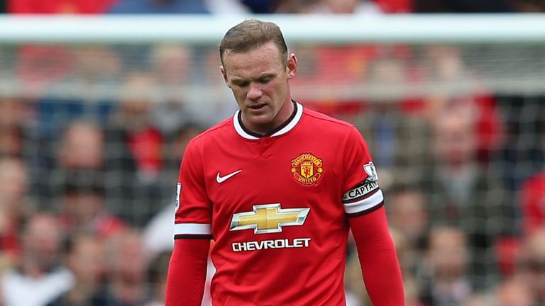 Wayne Rooney looks disconsolate as Manchester United lose 2-1 at home to Swansea