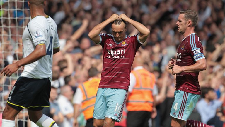 West Ham United's Mark Noble misses from the penalty spot during the Barclays Premier League match against Tottenham at Upton Park, London.