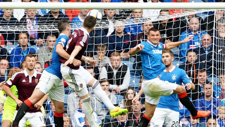 Danny Wilson scores for Hearts at Ibrox